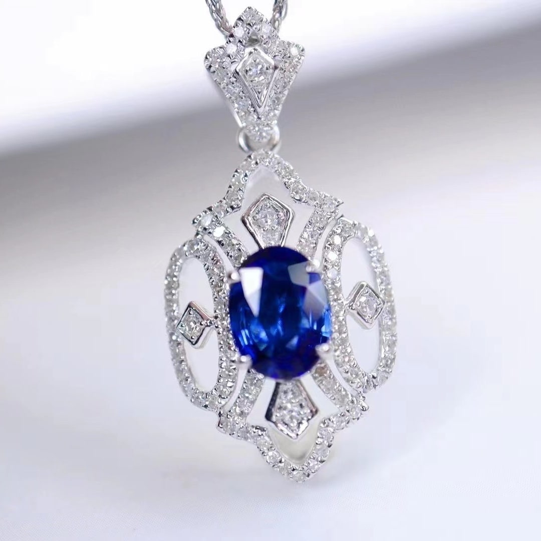 14k Gold 1.42 Ctw Natural Sapphire & Diamond Pendant( Without Chain ): Ref:230935073 // gold content:14k gold // main gemstone:sapphire // shape:oval // carat weight:1. 1ct // color:royal blue // treatment:natural // // adjacent gemstone 2 : diamond // shape:round //
