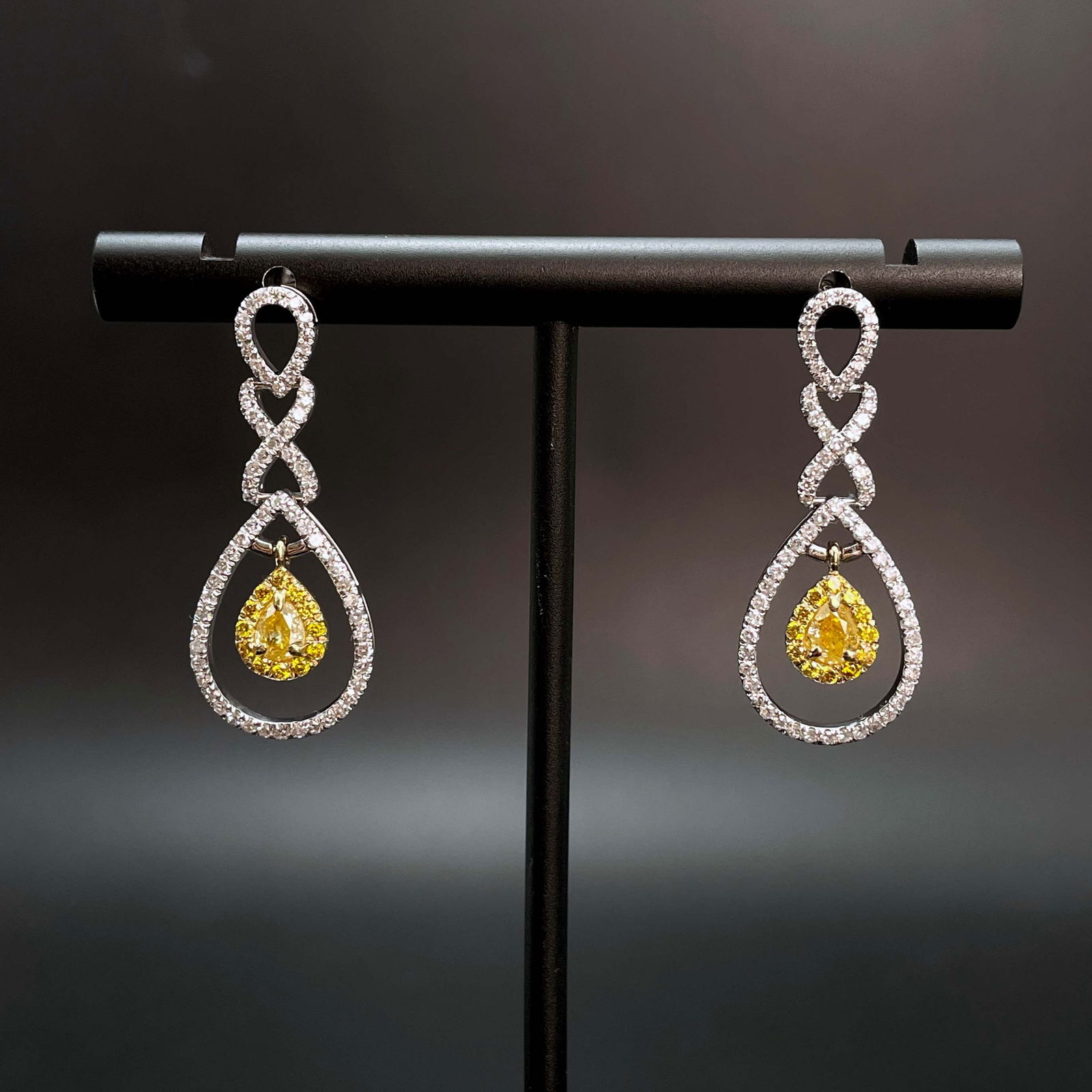 14k Gold 0.50 Ct Natural Color Diamond Earrings: Ref:230935088 // gold content:14k gold // main gemstone:diamond // shape:multiply // carat weight:0. 50ct // clarity grade:vs-si // color:color // treatment:natural // Condition: NewLow Estimate: