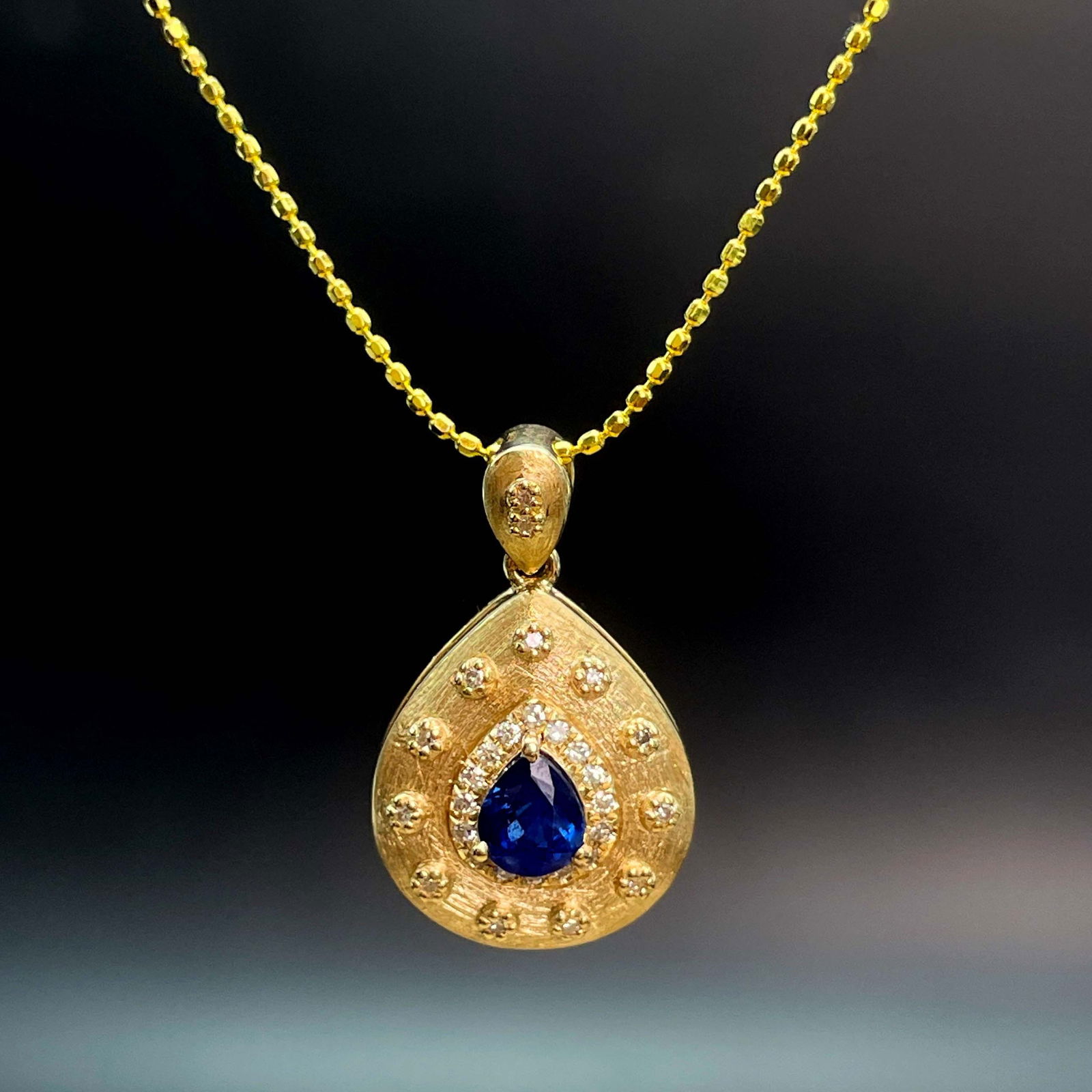 14k Gold 0.48 Ctw Vivid Blue Natural Sapphire & Diamond Pendant( Without Chain ): Ref:230935105 // gold content:14k gold // main gemstone:sapphire // shape:pear // carat weight:0. 4ct // color:vivid blue // treatment:natural // // adjacent gemstone 2 : diamond // shape:round //