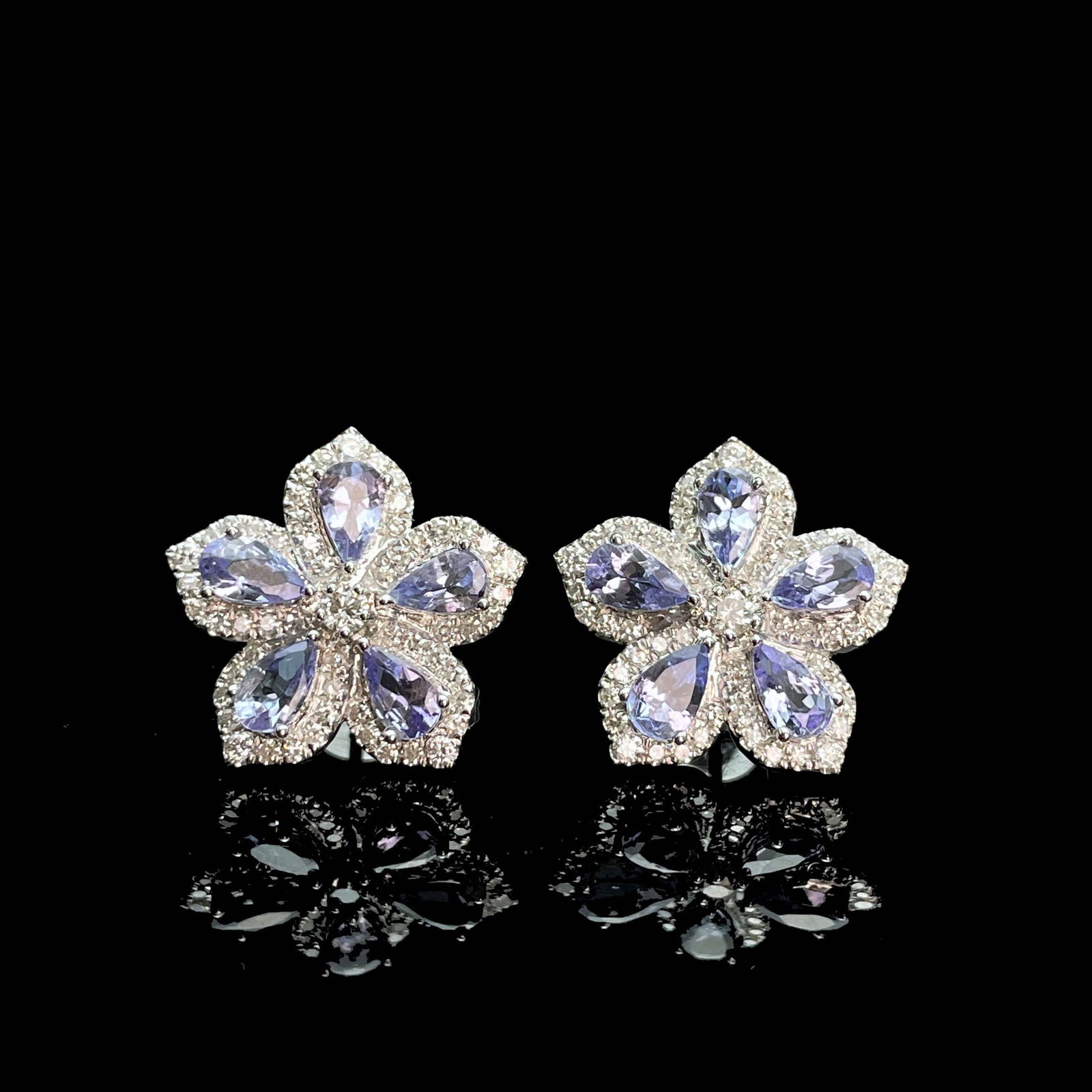 14k Gold 2.62 Ctw Natural Tanzanite & Diamond & Flowers Earrings: Ref:230935120 // gold content:14k gold // main gemstone:tanzanite // shape:pear // carat weight:1. 90ct // color:purple // treatment:natural // // adjacent gemstone 2 : diamond // shape:round // carat