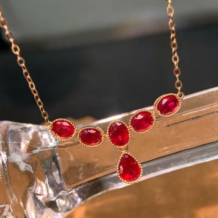 14k Gold 1.48 Ct Natural Ruby Necklace: Ref:230935155 // gold content:14k gold // main gemstone:ruby // shape:multiply // carat weight:1. 48ct // color:red // treatment:natural // Condition: NewLow Estimate: 1400.00High Estimate: 2100.00