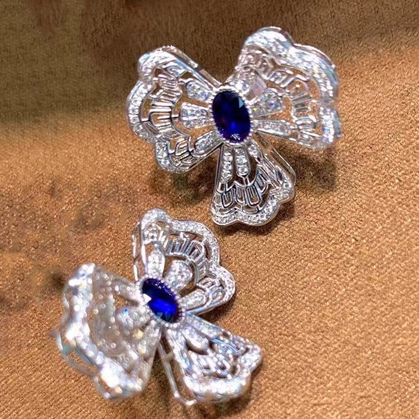 14k Gold 1.56 Ctw Natural Sapphire & Diamond Earrings: Ref:230935175 // gold content:14k gold // main gemstone:sapphire // shape:oval // carat weight:1. 15ct // color:royal blue // treatment:natural // // adjacent gemstone 2 : diamond // shape:round //