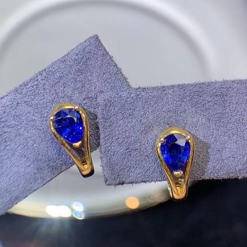 14k Gold 0.60 Ct Natural Sapphire Earrings: Ref:230935211 // gold content:14k gold // main gemstone:sapphire // shape:pear // carat weight:0. 60ct // color:royal blue // treatment:natural // Condition: NewLow Estimate: 1100.00High Estimate: