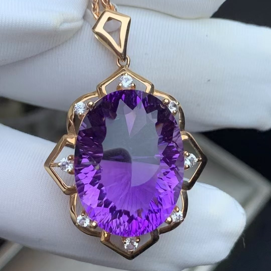 14k Gold 20 Ct Natural Amethyst & Sapphire Pendant( Without Chain ): Ref:230935214 // gold content:14k gold // main gemstone:amethyst // shape:oval // carat weight:20ct // color:purple // treatment:natural // // adjacent gemstone 2 : sapphire // number of stones:8