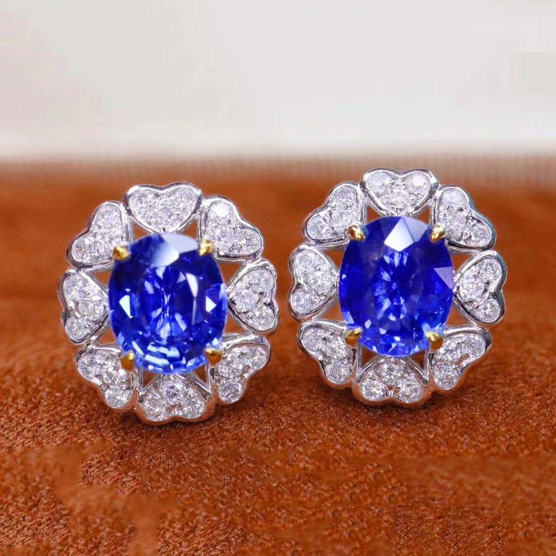 14k Gold 1.94 Ctw Natural Sapphire & Diamond Earrings: Ref:230935250 // gold content:14k gold // main gemstone:sapphire // shape:oval // carat weight:1. 7ct // color:royal blue // treatment:natural // // adjacent gemstone 2 : diamond // shape:round //