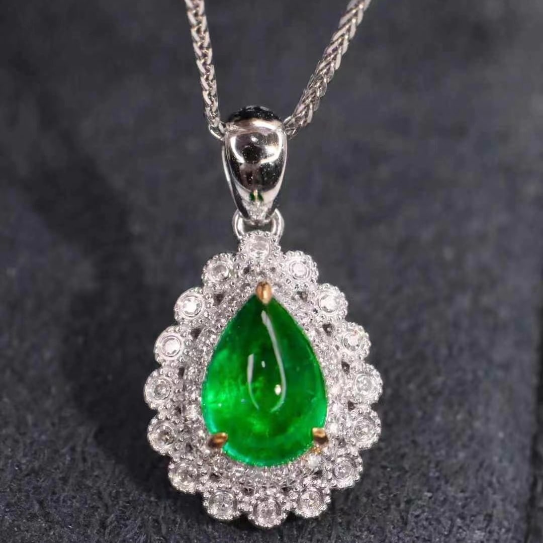 14k Gold 1.46 Ctw Vivid Green Natural Emerald & Diamond Pendant( Without Chain ): Ref:230935259 // gold content:14k gold // main gemstone:emerald // shape:pear // carat weight:1. 3ct // color:vivid green // treatment:natural // // adjacent gemstone 2 : diamond // shape:round //