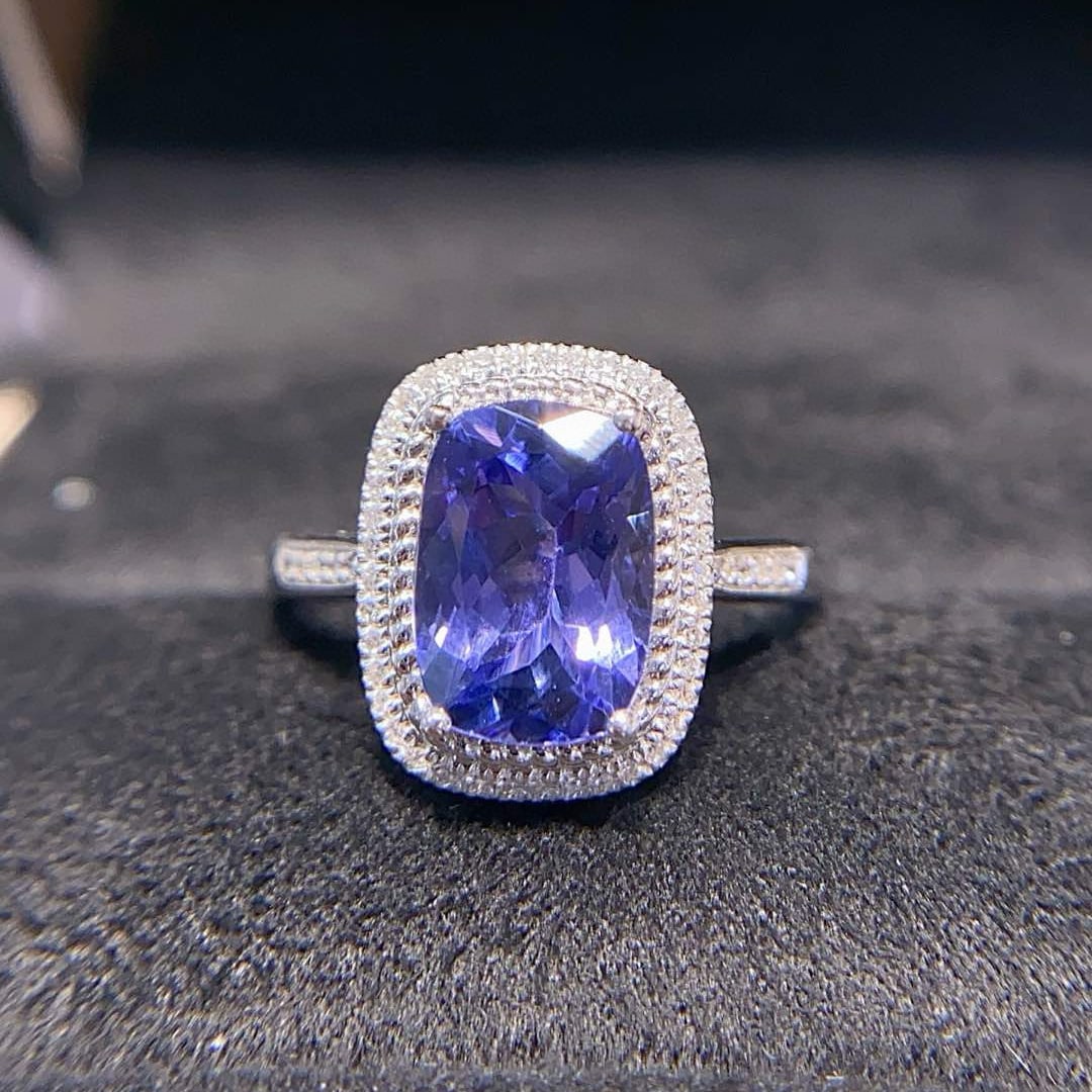 14k Gold 2.67 Ctw Natural Tanzanite & Diamond Ring: Ref:230936020 // gold content:14k gold // ring size:7. 25us // // main gemstone:tanzanite // shape:cushion // carat weight:2. 55ct // color:blue // treatment:natural // // adjacent gemstone 2 : diamon