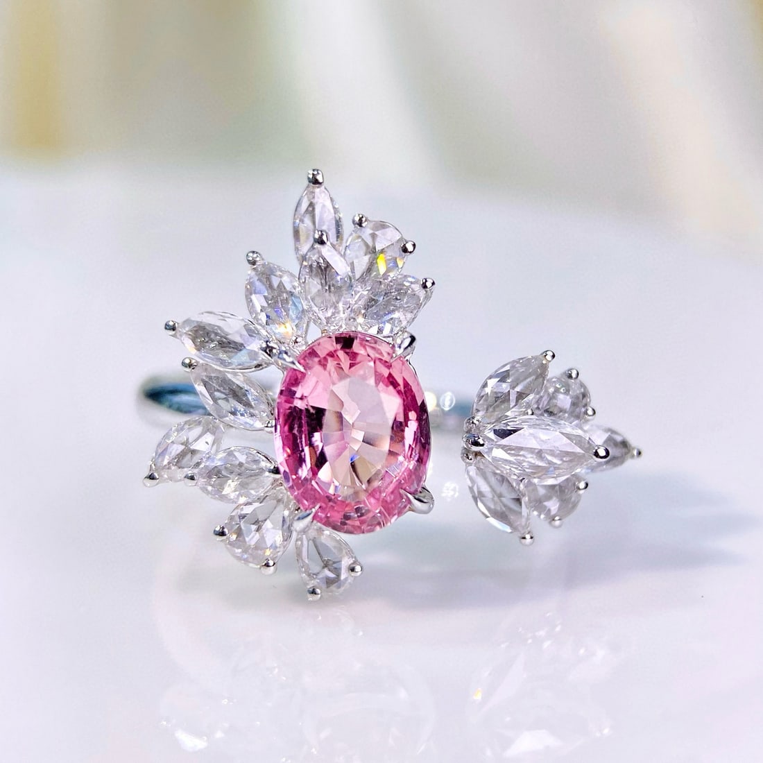 14k Gold 2.62 Ctw Natural Padparadscha Sapphire & Diamond Ring: Ref:230936021 // gold content:14k gold // ring size:7. 25us // // main gemstone:padparadscha sapphire // shape:oval // carat weight:1. 61ct // color:orangish pink // treatment:natural // // adjacent g