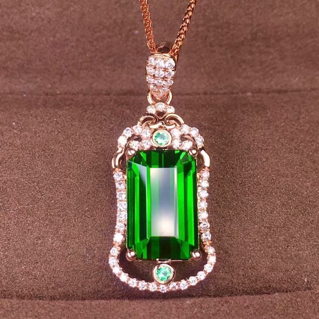14k Gold 4.1 Ct Natural Tourmaline & Diamond Pendant( Without Chain ): Ref:230936089 // gold content:14k gold // main gemstone:tourmaline // shape:octagonal // carat weight:4. 1ct // color:green // treatment:natural // // adjacent gemstone 2 : diamond // shape:round