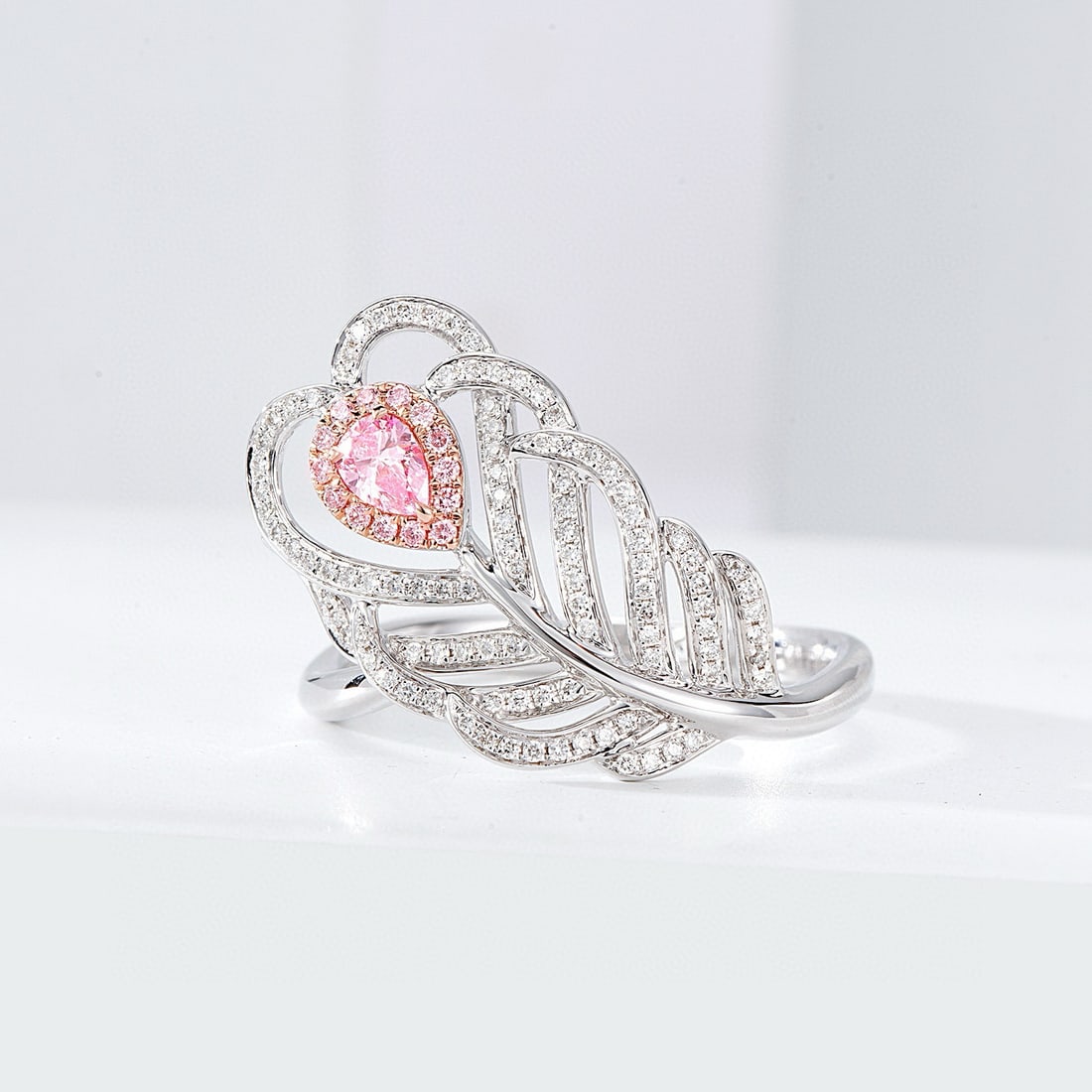 14k Gold 0.33 Ctw Natural Pink Diamond & Diamond Ring: Ref:230936152 // gold content:14k gold // ring size:7. 25us // // main gemstone:pink diamond // shape:pear // carat weight:0. 11ct // color:pink // treatment:natural // // adjacent gemstone 2 :