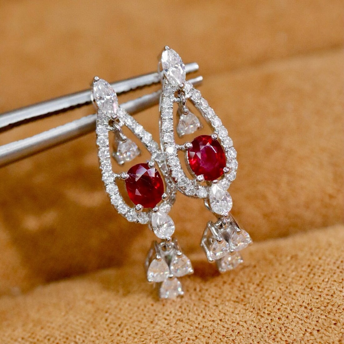 14k Gold 0.68 Ctw Natural Ruby & Diamond Earrings: Ref:230936174 // gold content:14k gold // main gemstone:ruby // shape:oval // carat weight:0. 51ct // color:red // treatment:natural // // adjacent gemstone 2 : diamond // shape:round // carat