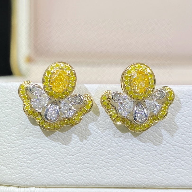 14k Gold 0.84 Ctw Natural Yellow Diamond & Diamond Earrings: Ref:230936195 // gold content:14k gold // main gemstone:yellow diamond // shape:oval // carat weight:0. 38ct // color:yellow // treatment:natural // // adjacent gemstone 2 : diamond //