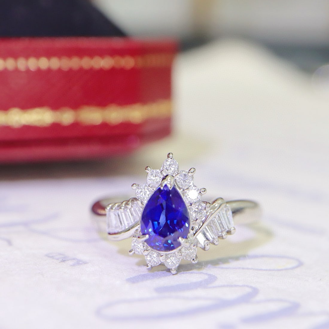 14k Gold 1.36 Ctw Natural Sapphire & Diamond Ring: Ref:230936268 // gold content:14k gold // ring size:7. 25us // // main gemstone:sapphire // shape:pear // carat weight:1. 04ct // color:royal blue // treatment:natural // // adjacent gemstone 2 :