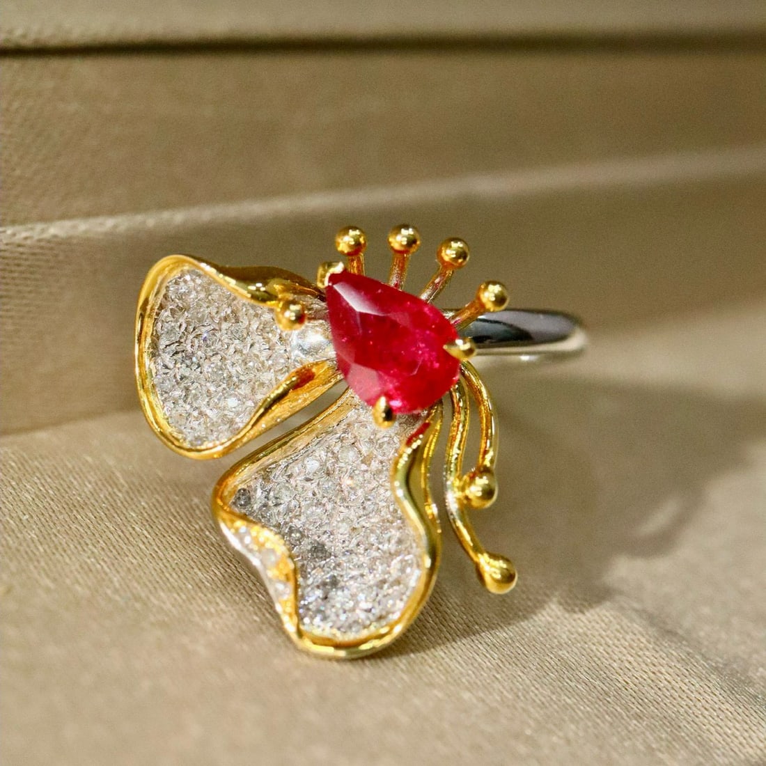 14k Gold 1.17 Ctw Natural Ruby & Diamond Ring: Ref:230936271 // gold content:14k gold // ring size:7. 25us // // main gemstone:ruby // shape:pear // carat weight:0. 93ct // color:red // treatment:natural // // adjacent gemstone 2 : diamond //
