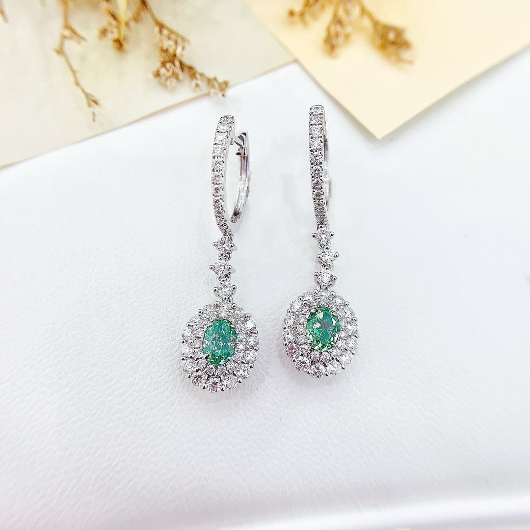 14k Gold 1.92 Ctw Natural Green Diamond & Diamond Earrings: Ref:230936275 // gold content:14k gold // main gemstone:green diamond // shape:oval // carat weight:0. 90ct // color:green // treatment:natural // // adjacent gemstone 2 : diamond // shape:round //
