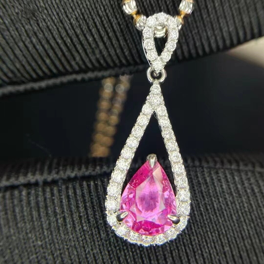 14k Gold 1.46 Ctw Natural Padparadscha Sapphire & Diamond Pendant( Without Chain ): Ref:230936295 // gold content:14k gold // main gemstone:padparadscha sapphire // shape:pear // carat weight:1. 18ct // color:orangish pink // treatment:natural // // adjacent gemstone 2 : diamond