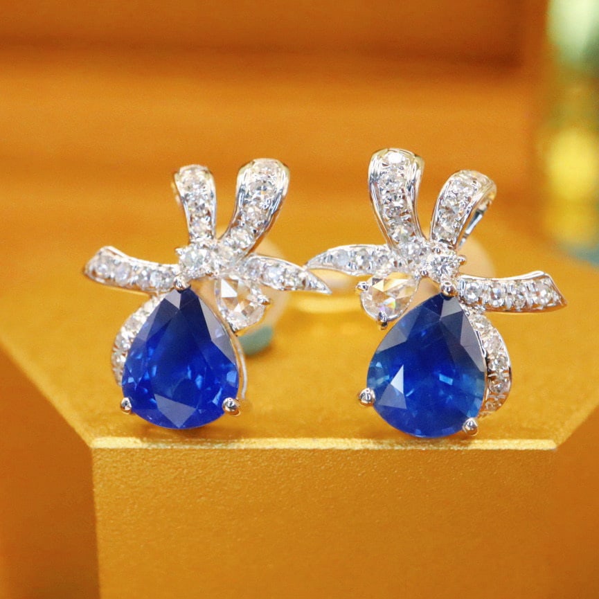 14k Gold 1.79 Ctw Natural Sapphire & Diamond Earrings: Ref:230936336 // gold content:14k gold // main gemstone:sapphire // shape:pear // carat weight:1. 55ct // color:royal blue // treatment:natural // // adjacent gemstone 2 : diamond // number of