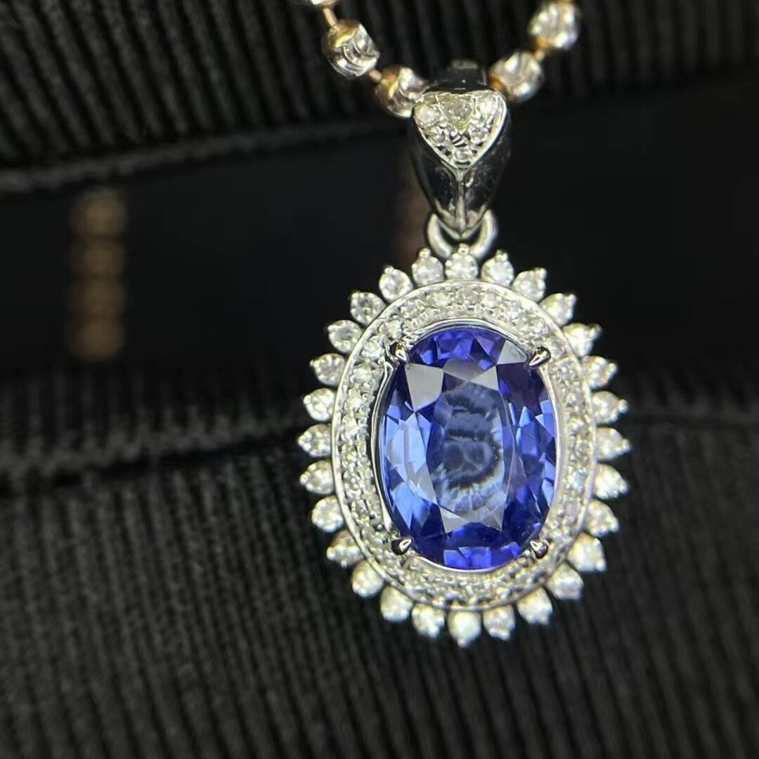 14k Gold 1.50 Ct Natural Sapphire & Diamond Pendant( Without Chain ): Ref:230936348 // gold content:14k gold // main gemstone:sapphire // shape:oval // carat weight:1. 50ct // color:blue // treatment:natural // // adjacent gemstone 2 : diamond // number of stones:64