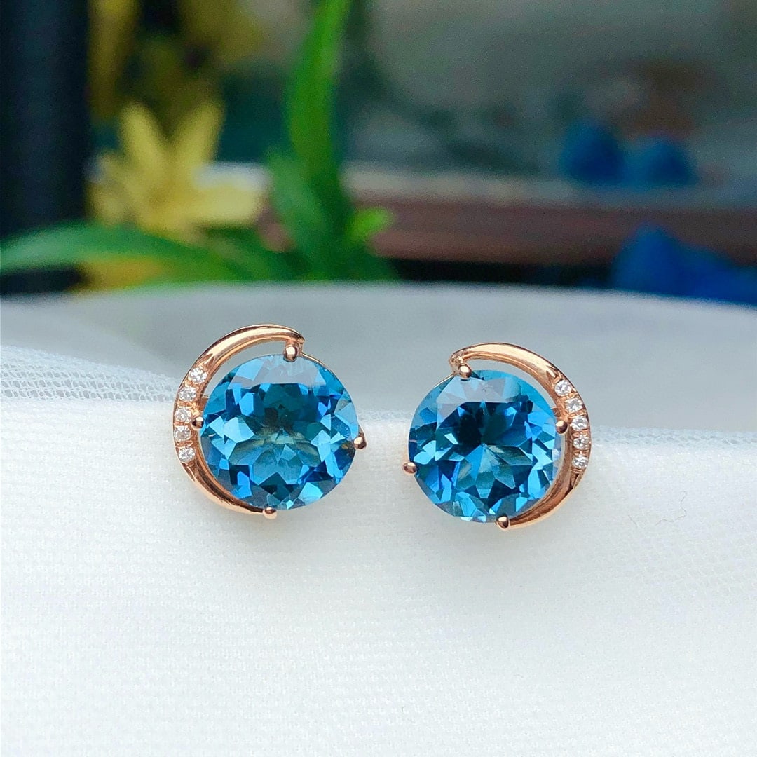 14k Gold 4.20 Ct Natural Topaz & Diamond Earrings: Ref:230936349 // gold content:14k gold // main gemstone:topaz // shape:round // carat weight:4. 20ct // color:blue // treatment:natural // cut grade:g // // adjacent gemstone 2 : diamond // number