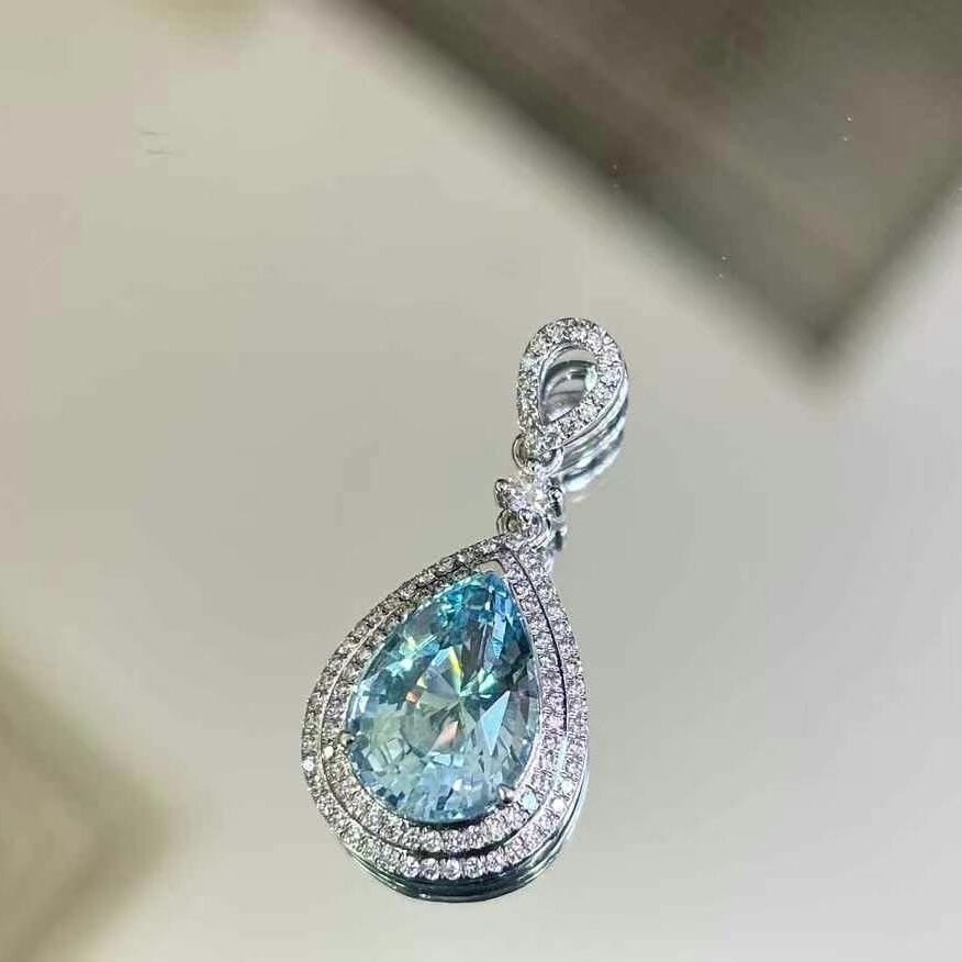 14k Gold 3.21 Ct Natural Aquamarine & Diamond Pendant( Without Chain ): Ref:230936395 // gold content:14k gold // main gemstone:aquamarine // shape:pear // carat weight:3. 21ct // color:santa maria color // treatment:natural // // adjacent gemstone 2 : diamond // shape:ro