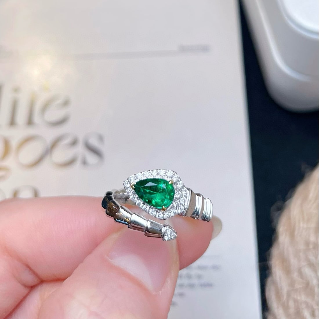 14k Gold 0.79 Ctw Vivid Green Natural Emerald & Diamond Ring: Ref:230936407 // gold content:14k gold // ring size:7. 25us // // main gemstone:emerald // shape:pear // carat weight:0. 63ct // color:vivid green // treatment:natural // // adjacent gemstone 2 :