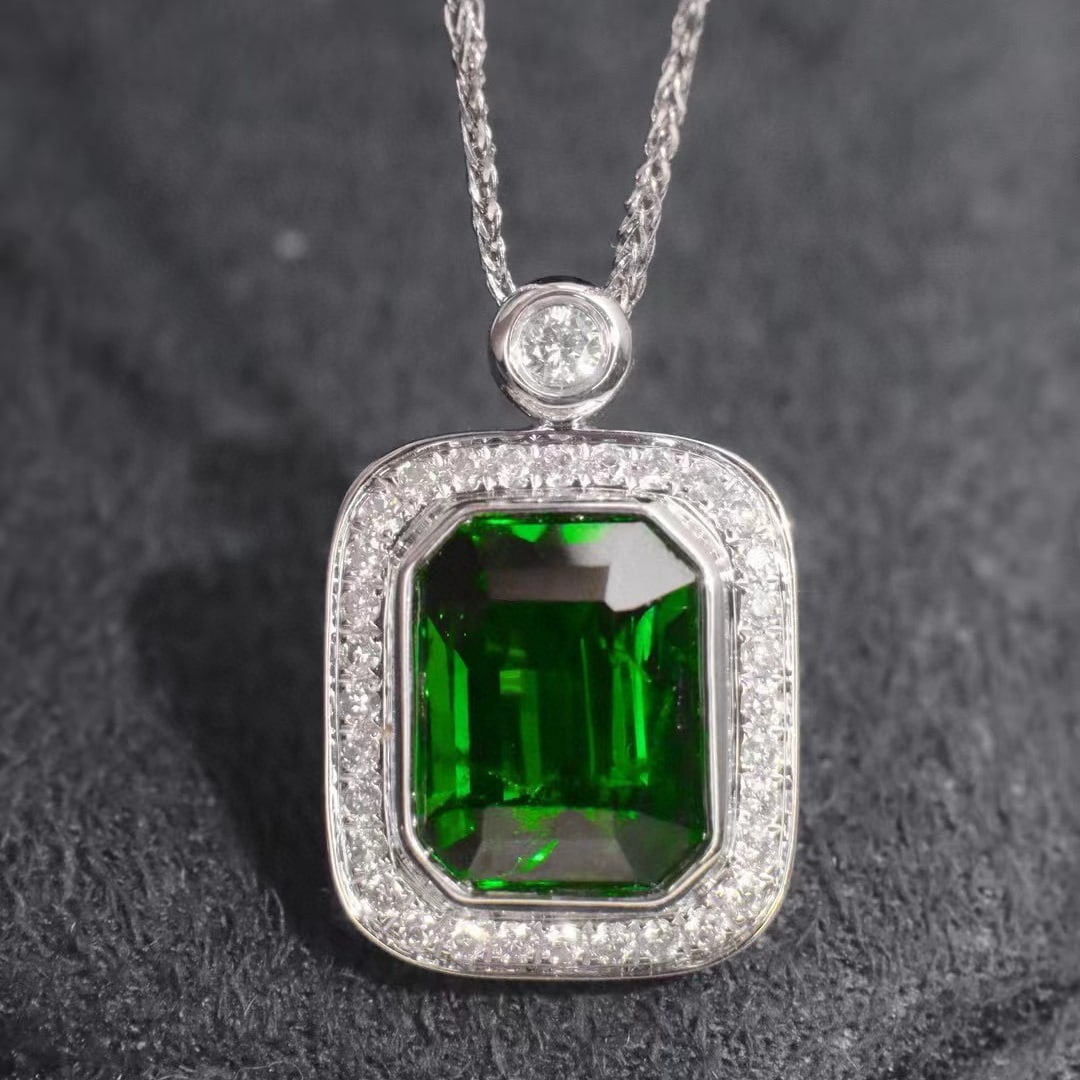 14k Gold 2.74 Ctw Vivid Green Natural Tsavorite & Diamond Pendant( Without Chain ): Ref:230936427 // gold content:14k gold // main gemstone:tsavorite // shape:octagonal // carat weight:2. 55ct // color:vivid green // treatment:natural // // adjacent gemstone 2 : diamond //