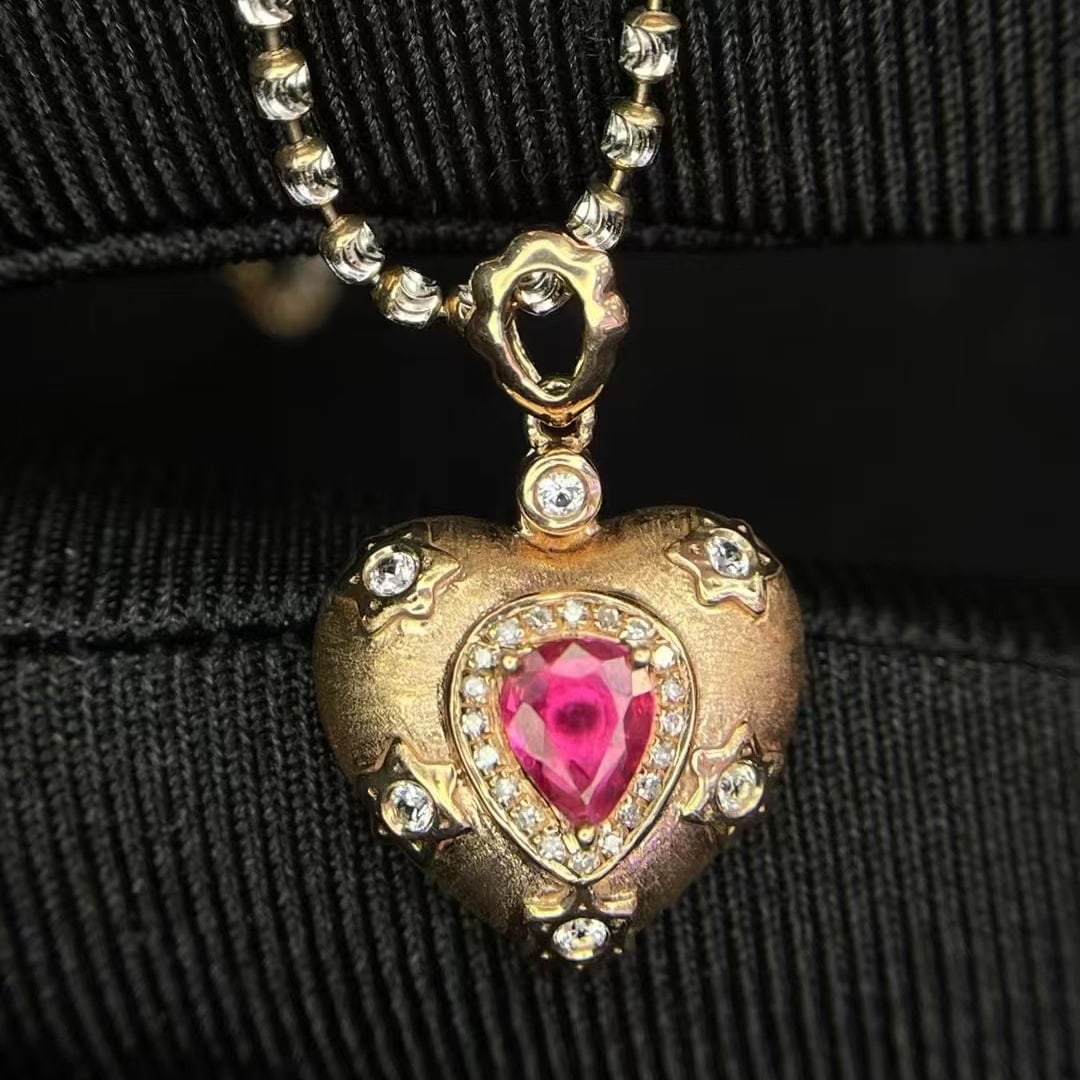 14k Gold 0.45 Ct Natural Ruby & Diamond & Sapphire Pendant( Without Chain ): Ref:230936436 // gold content:14k gold // main gemstone:ruby // shape:pear // carat weight:0. 45ct // color:red // treatment:natural // // adjacent gemstone 2 : diamond // number of stones:21 //