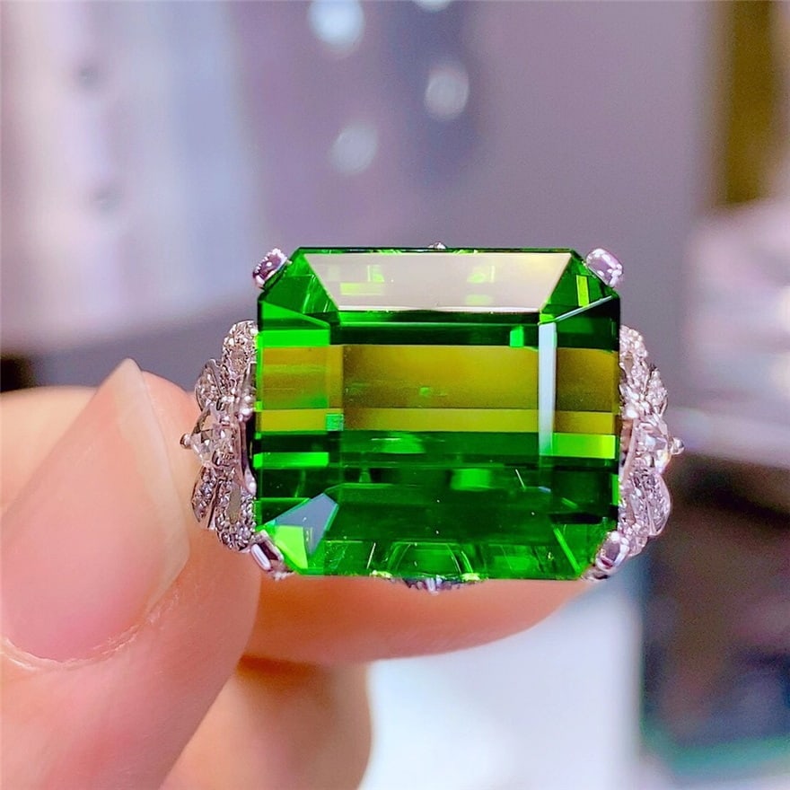 14k Gold 16.8 Ct Natural Tourmaline & Diamond Ring: Ref:230939004 // gold content:14k gold // ring size:7. 25us // // main gemstone:tourmaline // shape:octagonal // carat weight:16. 8ct // color:green // treatment:natural // // adjacent gemstone 2 : di