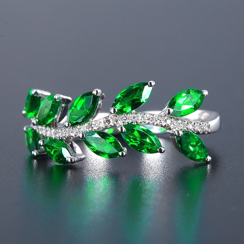 14k Gold 1.48 Ctw Vivid Green Natural Tsavorite & Diamond Ring: Ref:230939013 // gold content:14k gold // ring size:7. 25us // // main gemstone:tsavorite // shape:marquise // carat weight:1. 39ct // color:vivid green // treatment:natural // // adjacent