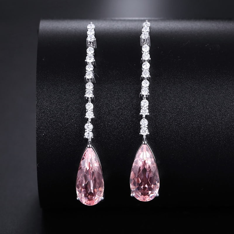 14k Gold 3.70 Ctw Natural Morganite & Diamond Earrings: Ref:230939020 // gold content:14k gold // main gemstone:morganite // shape:pear // carat weight:3. 27ct // color:pink // treatment:natural // // adjacent gemstone 2 : diamond // shape:round //