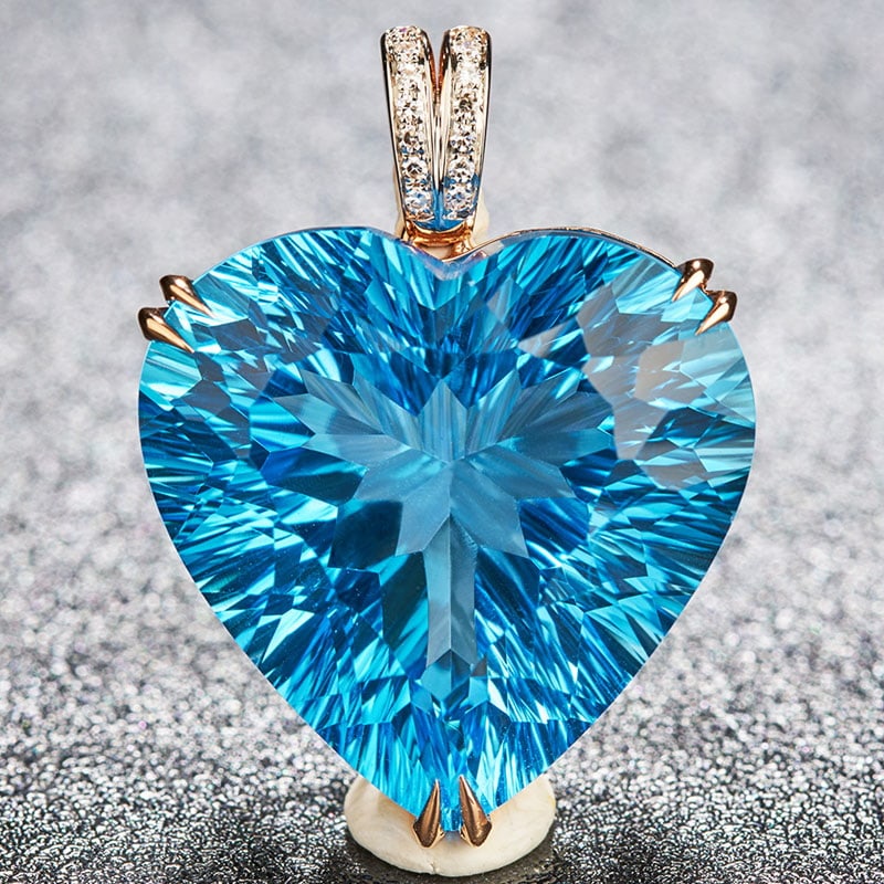 14k Gold 24.68 Ct Natural Topaz & Diamond Pendant( Without Chain ): Ref:230939031 // gold content:14k gold // main gemstone:topaz // shape:heart // carat weight:24. 68ct // color:blue // treatment:natural // // adjacent gemstone 2 : diamond // shape:round //