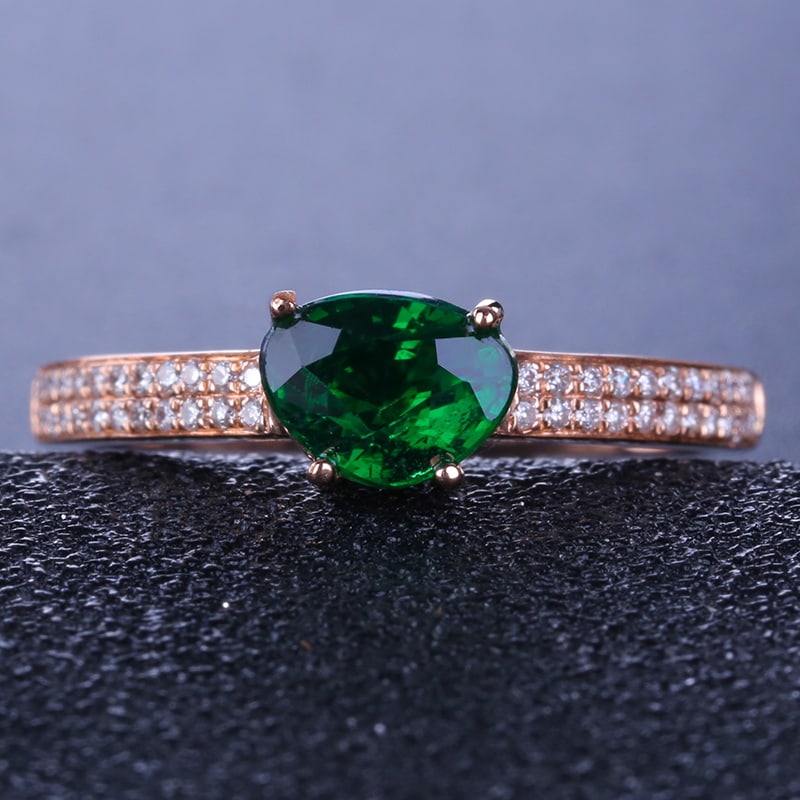 14k Gold 1.15 Ctw Vivid Green Natural Tsavorite & Diamond Ring: Ref:230939149 // gold content:14k gold // ring size:7. 25us // // main gemstone:tsavorite // shape:pear // carat weight:1. 01ct // color:vivid green // treatment:natural // // adjacent gemstone 2