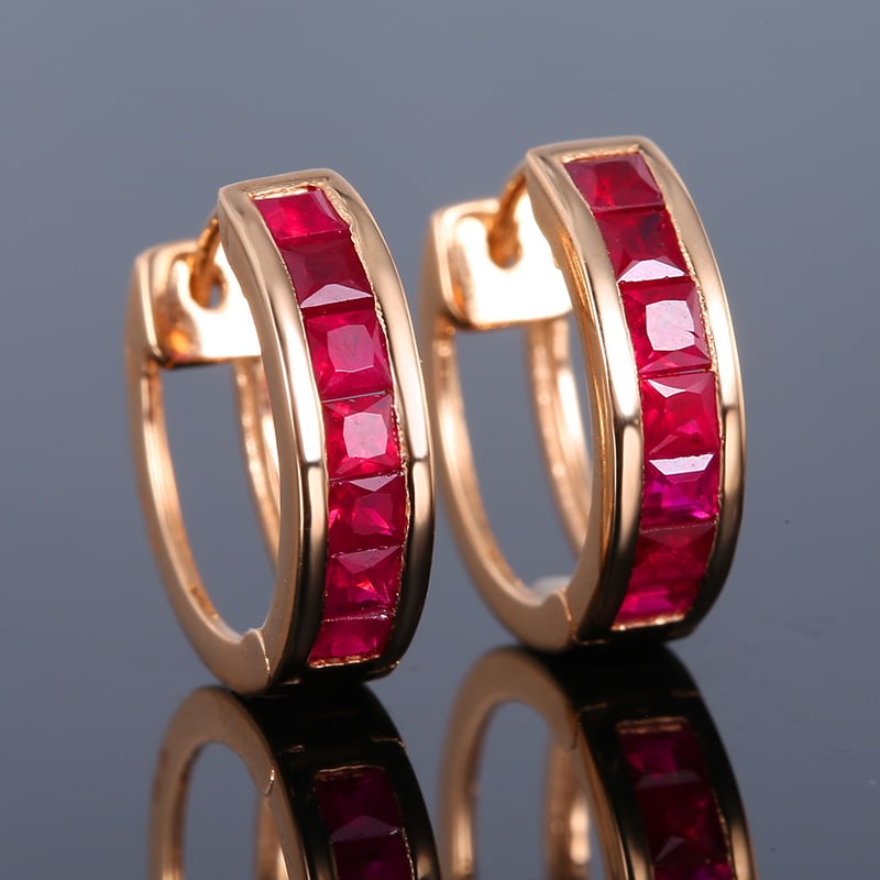 14k Gold 1.2 Ct Natural Ruby Earrings: Ref:230939179 // gold content:14k gold // main gemstone:ruby // shape:princess // carat weight:1. 2ct // color:red // treatment:natural // Condition: NewLow Estimate: 1300.00High Estimate: 2000.00