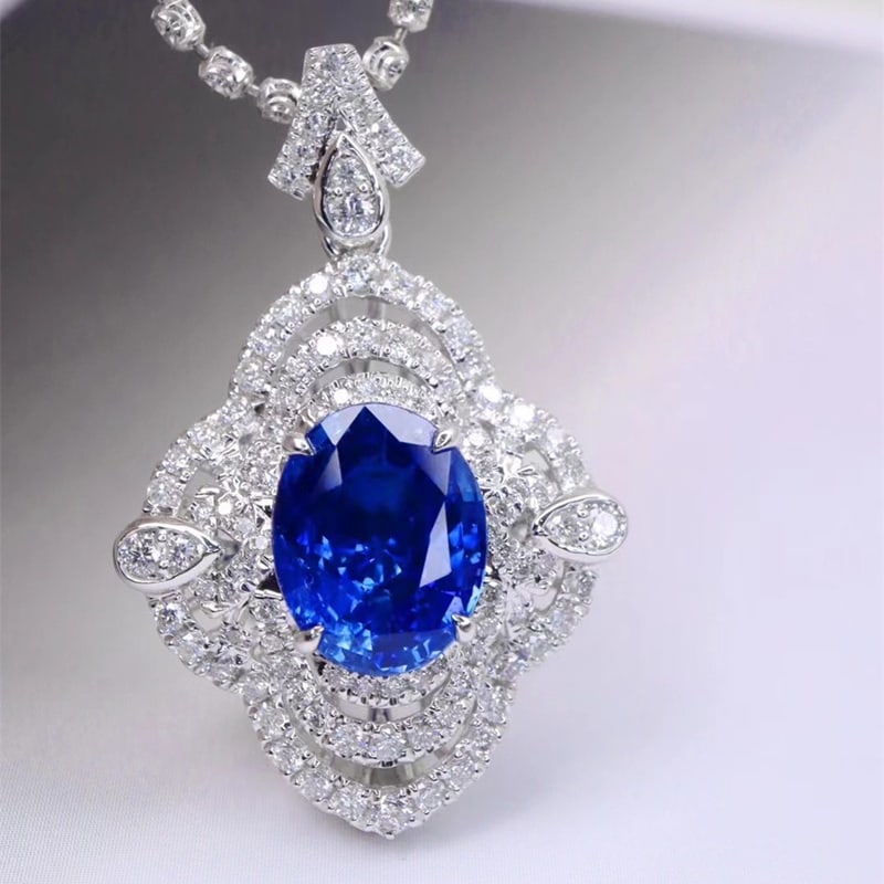 14k Gold 3.43 Ctw Natural Sapphire & Diamond Pendant( Without Chain ): Ref:230939240 // gold content:14k gold // main gemstone:sapphire // shape:oval // carat weight:2. 85ct // color:royal blue // treatment:natural // // adjacent gemstone 2 : diamond // shape:round // ca