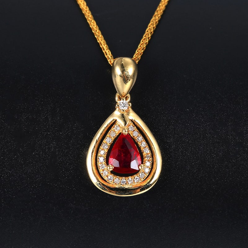 14k Gold 0.32 Ctw Natural Ruby & Diamond Pendant( Without Chain ): Ref:230939256 // gold content:14k gold // main gemstone:ruby // shape:pear // carat weight:0. 25ct // color:red // treatment:natural // // adjacent gemstone 2 : diamond // number of stones:23 //