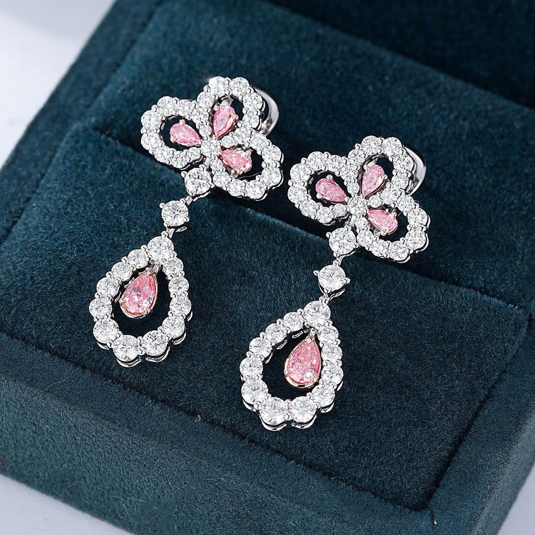 14k Gold 3.06 Ctw Natural Pink Diamond & Diamond Earrings: Ref:230940001 // gold content:14k gold // main gemstone:pink diamond // shape:pear // carat weight:0. 74ct // color:pink // treatment:natural // // adjacent gemstone 2 : diamond // shape:round //