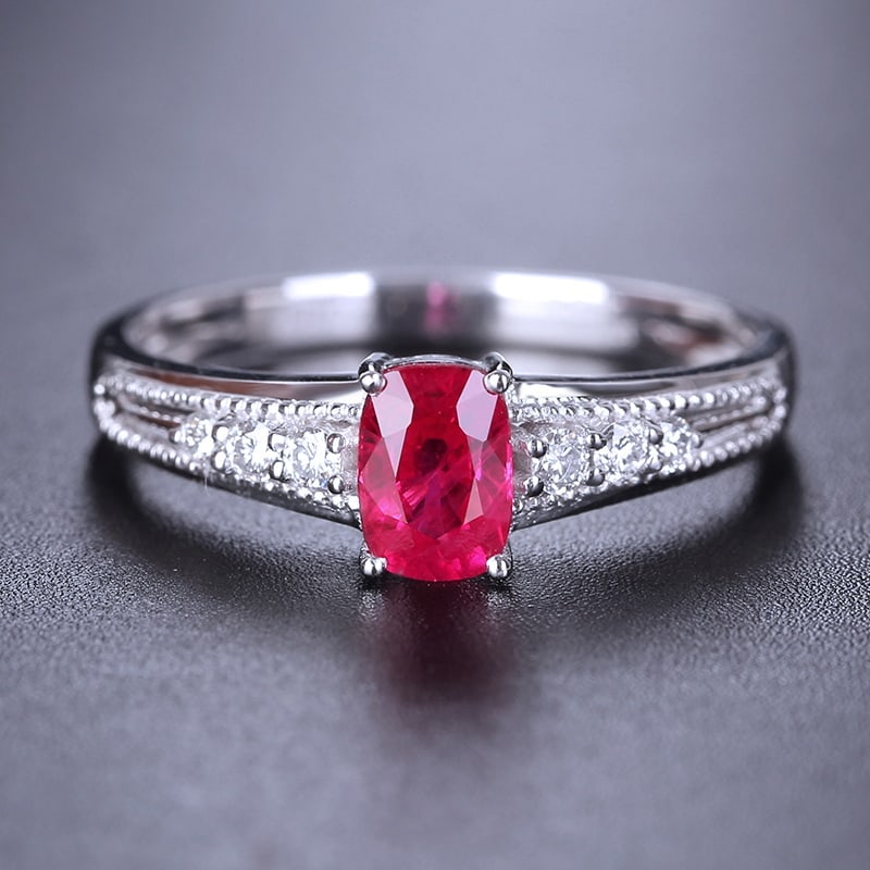 14k Gold 0.72 Ctw Natural Ruby & Diamond Ring: Ref:230940014 // gold content:14k gold // ring size:7. 25us // // main gemstone:ruby // shape:oval // carat weight:0. 61ct // color:red // treatment:natural // // adjacent gemstone 2 : diamond //