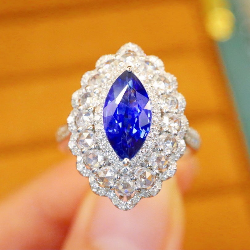14k Gold 2.27 Ctw Natural Sapphire & Diamond Ring: Ref:230940083 // gold content:14k gold // ring size:7. 25us // // main gemstone:sapphire // shape:marquise // carat weight:1. 51ct // color:royal blue // treatment:natural // // adjacent gemstone 2 :