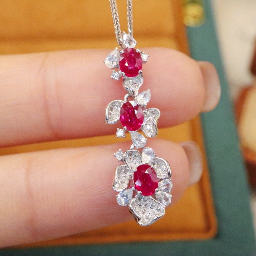 14k Gold 0.99 Ctw Natural Ruby & Diamond Pendant( Without Chain ): Ref:230940090 // gold content:14k gold // main gemstone:ruby // shape:oval // carat weight:0. 82ct // color:pigeonblood red // treatment:natural // // adjacent gemstone 2 : diamond // number of
