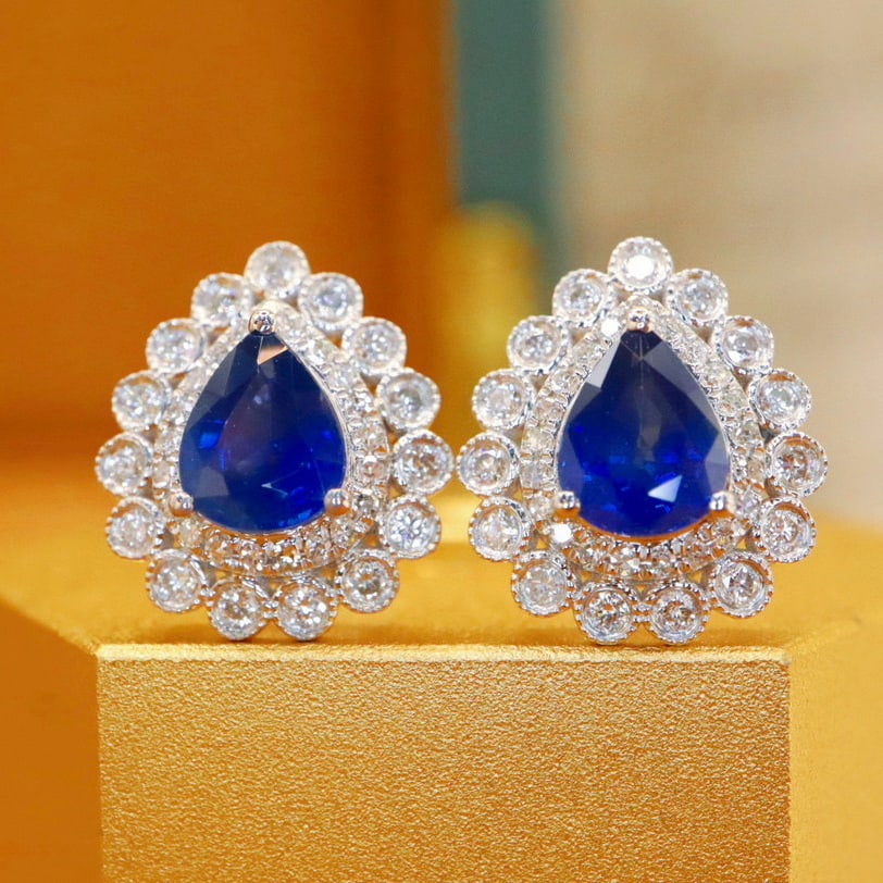 14k Gold 1.81 Ctw Natural Sapphire & Diamond Earrings: Ref:230940115 // gold content:14k gold // main gemstone:sapphire // shape:pear // carat weight:1. 39ct // color:royal blue // treatment:natural // // adjacent gemstone 2 : diamond // number of