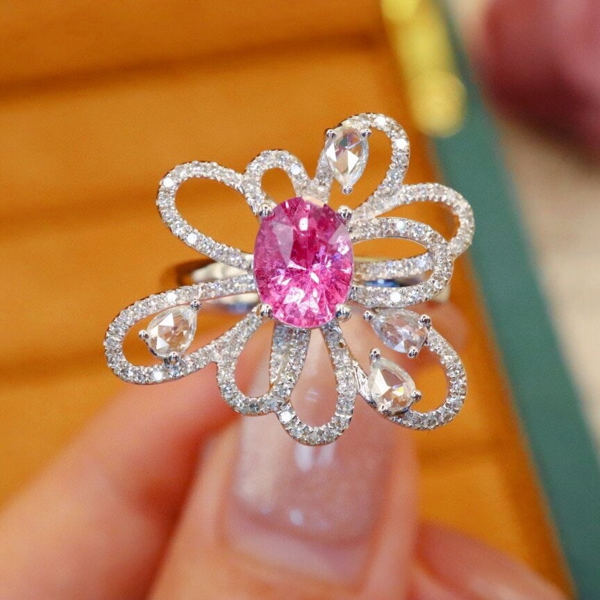 14k Gold 1.94 Ctw Natural Padparadscha Sapphire & Diamond Ring: Ref:230940137 // gold content:14k gold // ring size:7. 25us // // main gemstone:padparadscha sapphire // shape:oval // carat weight:1. 46ct // color:orangish pink // treatment:natural // //