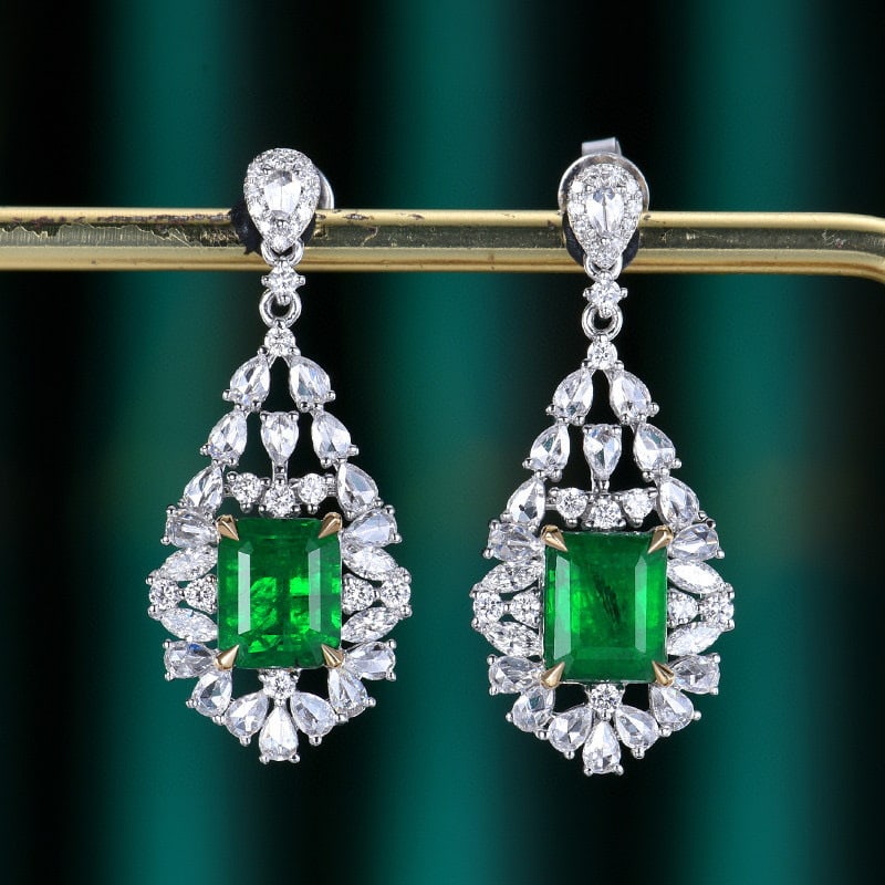 14k Gold 4.46 Ctw Vivid Green Natural Emerald & Diamond Earrings: Ref:230940150 // gold content:14k gold // main gemstone:emerald // shape:octagonal // carat weight:3. 16ct // color:vivid green // treatment:natural // // adjacent gemstone 2 : diamond // number of