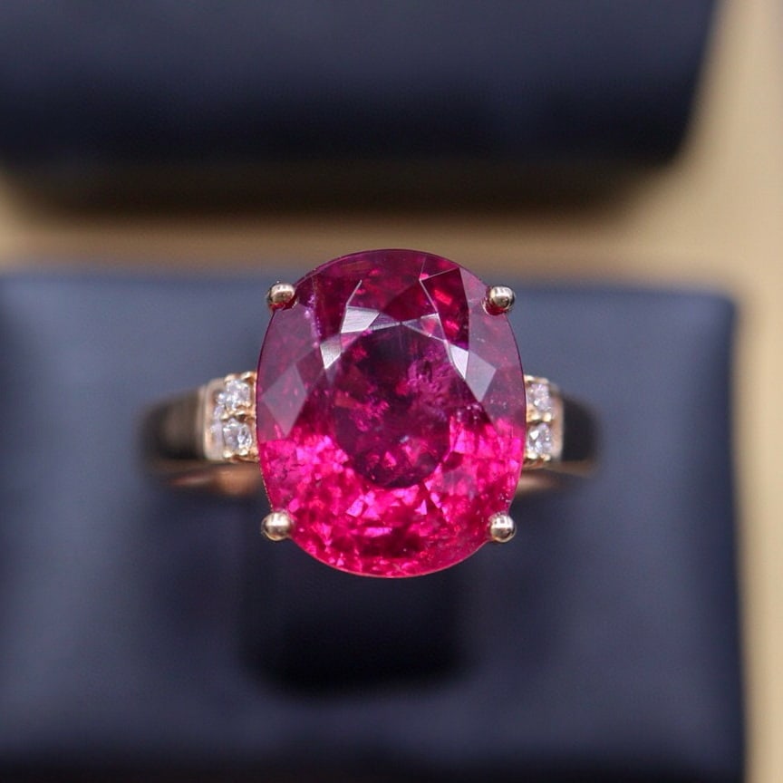 14k Gold 5.67 Ct Natural Tourmaline & Diamond Ring: Ref:230940182 // gold content:14k gold // ring size:7. 25us // // main gemstone:tourmaline // shape:oval // carat weight:5. 67ct // color:red // treatment:natural // // adjacent gemstone 2 :
