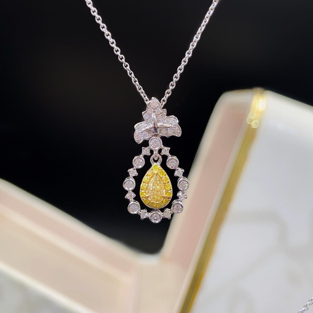 14k Gold 0.36 Ctw Natural Yellow Diamond & Diamond Necklace: Ref:230940197 // gold content:14k gold // main gemstone:yellow diamond // shape:pear // carat weight:0. 13ct // color:yellow // treatment:natural // // adjacent gemstone 2 : diamond // shape:round