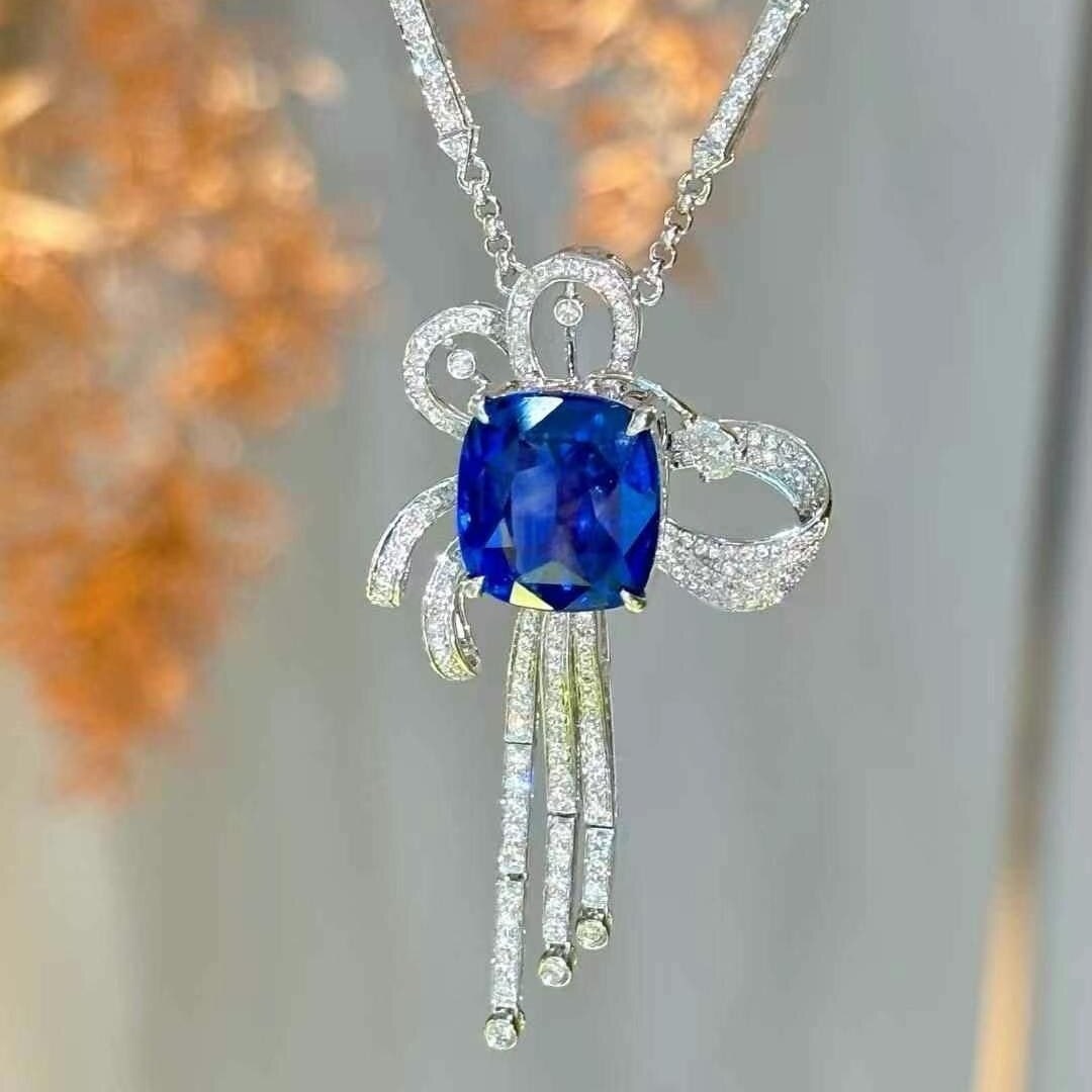 14k Gold 6.6 Ct Natural Sapphire & Diamond Necklace: Ref:230940213 // gold content:14k gold // main gemstone:sapphire // shape:cushion // carat weight:6. 6ct // color:royal blue // treatment:natural // // adjacent gemstone 2 : diamond // shape:round