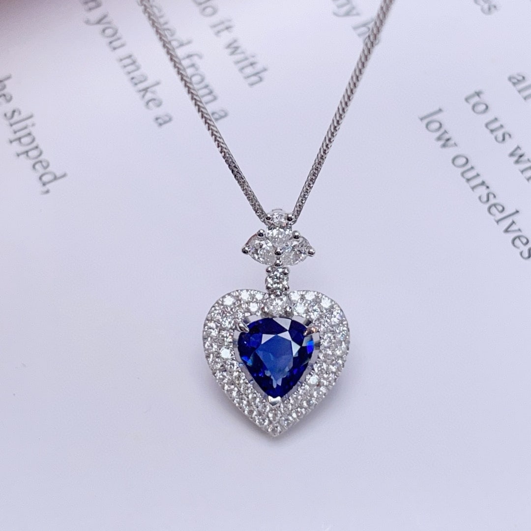 14k Gold 1.08 Ct Vivid Blue Natural Sapphire & Diamond Pendant( Without Chain ): Ref:230940225 // gold content:14k gold // main gemstone:sapphire // shape:pear // carat weight:1. 08ct // color:vivid blue // treatment:natural // // adjacent gemstone 2 : diamond // shape:multiply