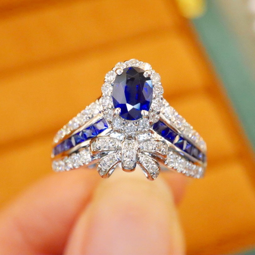 14k Gold 1.06 Ctw Natural Sapphire & Diamond Ring: Ref:230940277 // gold content:14k gold // ring size:7. 25us // // main gemstone:sapphire // shape:oval // carat weight:0. 66ct // color:royal blue // treatment:natural // // adjacent gemstone 2 :