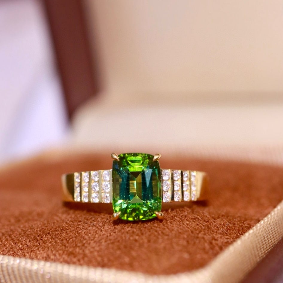 14k Gold 1.74 Ctw Natural Tourmaline & Diamond Ring: Ref:230940330 // gold content:14k gold // ring size:7. 25us // // main gemstone:tourmaline // shape:cushion // carat weight:1. 60ct // color:green // treatment:natural // // adjacent gemstone 2 :