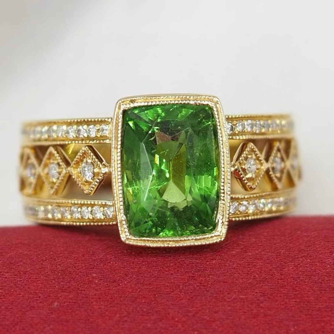 14k Gold 5.01 Ctw Natural Tsavorite & Diamond Ring: Ref:230940425 // gold content:14k gold // ring size:7. 25us // // main gemstone:tsavorite // shape:cushion // carat weight:4. 76ct // color:green // treatment:natural // // adjacent gemstone 2 : diamo