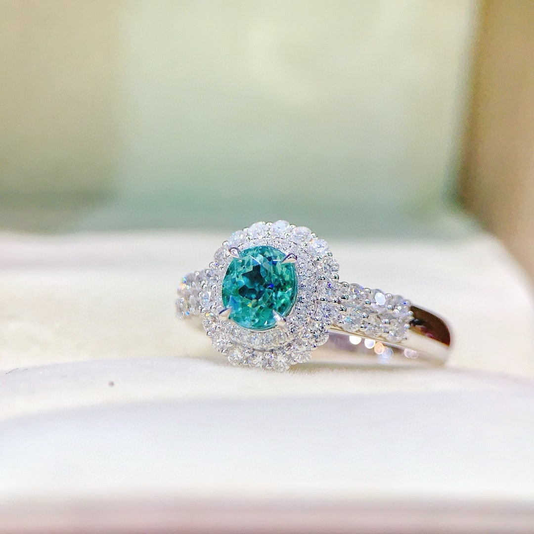 14k Gold 1.62 Ctw Natural Paraiba Tourmaline & Diamond Ring: Ref:230941022 // gold content:14k gold // ring size:7. 25us // // main gemstone:paraiba tourmaline // shape:oval // carat weight:1ct // color:bluish green // treatment:natural // // adjacent
